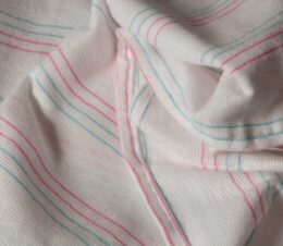 Our PerVal® Receiving Blankets feature the recognizable pink-blue stripes it is shown here folded to show the stripes. This image of the baby blanket shows the white version.