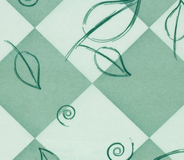 Detail of the pattern Leaves Pine for the Lapover Gown. The background in light green squares with dark green leaves randomly applied.