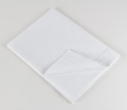 Standard Classic 7030 Woven Sheeting for hospitals and health systems. Available in flat sheet, pillowcase, or drawsheet. Folded flat sheet shown.