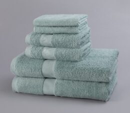 Our vat-dyed terry hospital towels are healthcare towels feature bright, long lasting color and softness. Featured here is a stack of Seafoam bath, hand and wash towels.